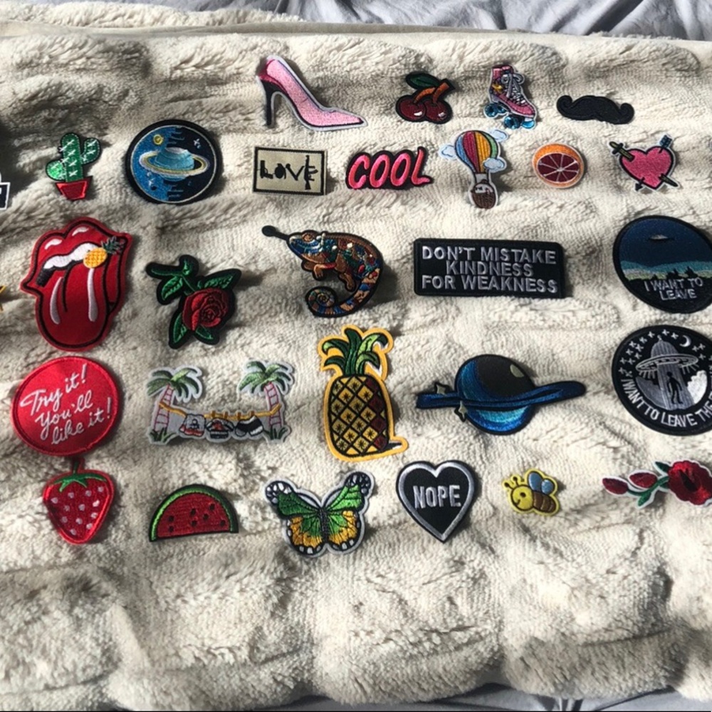 35 iron on patches. Great for designing a denim jacket.